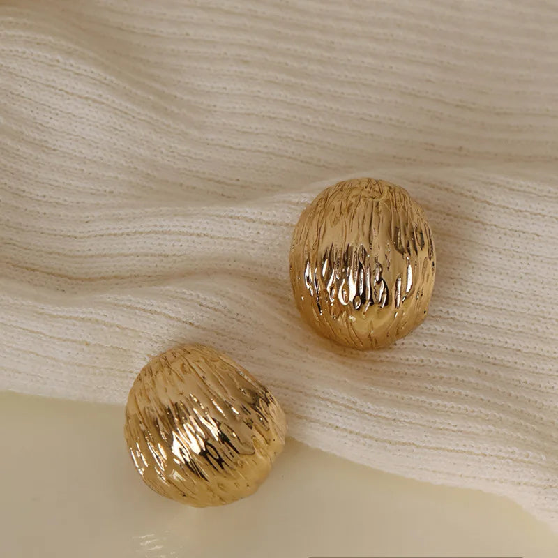 Zenat Golden Woven Clip-On Earrings – Geometric Non-Pierced