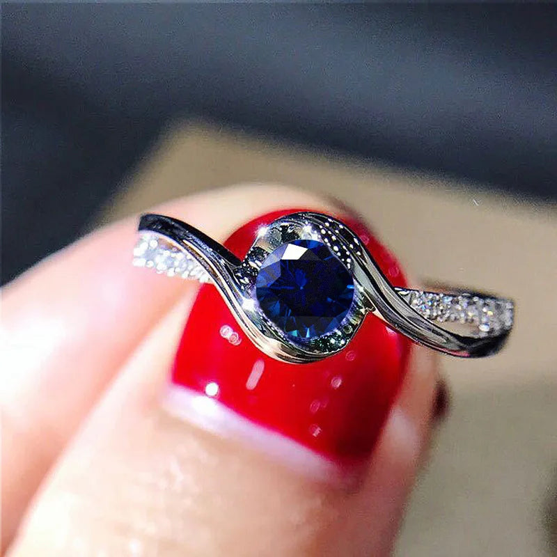 Zenat Luxury Prong Rings – Deep Blue Zircon