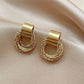 Zenat Golden Woven Clip-On Earrings – Geometric Non-Pierced
