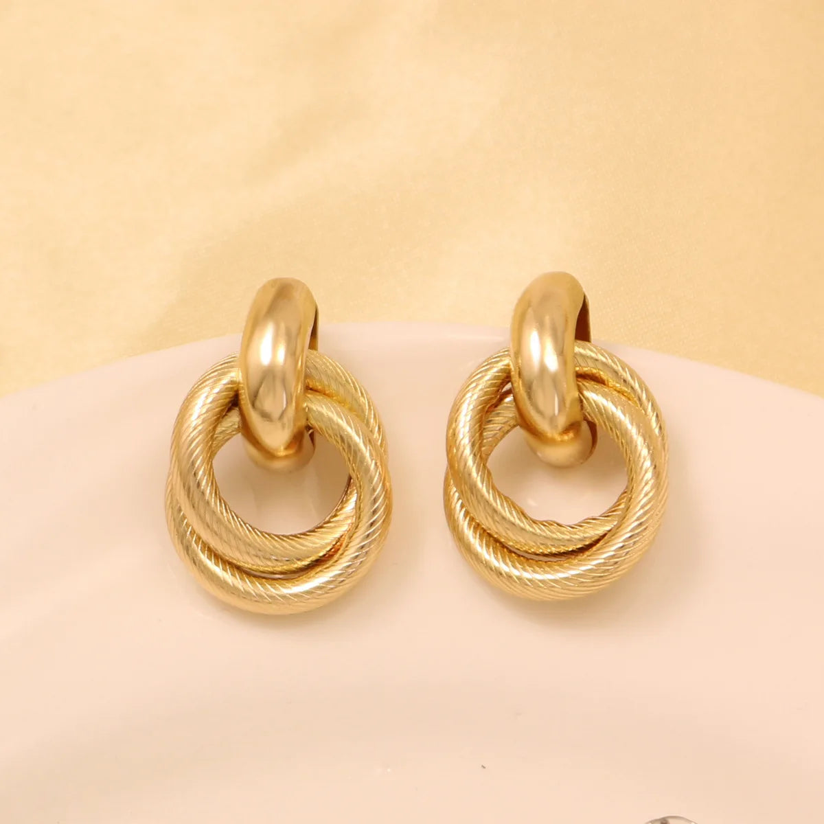 Zenat Golden Woven Clip-On Earrings – Geometric Non-Pierced